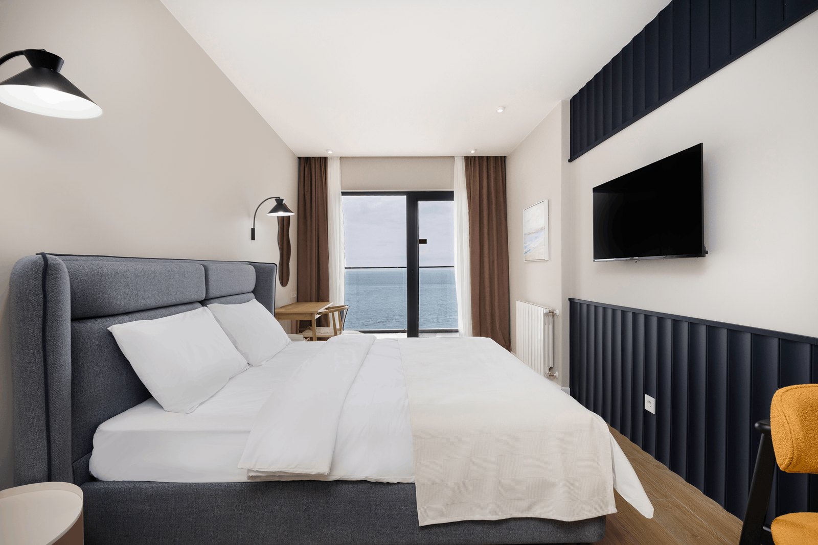 NEXT White bedroom opening towards the coast