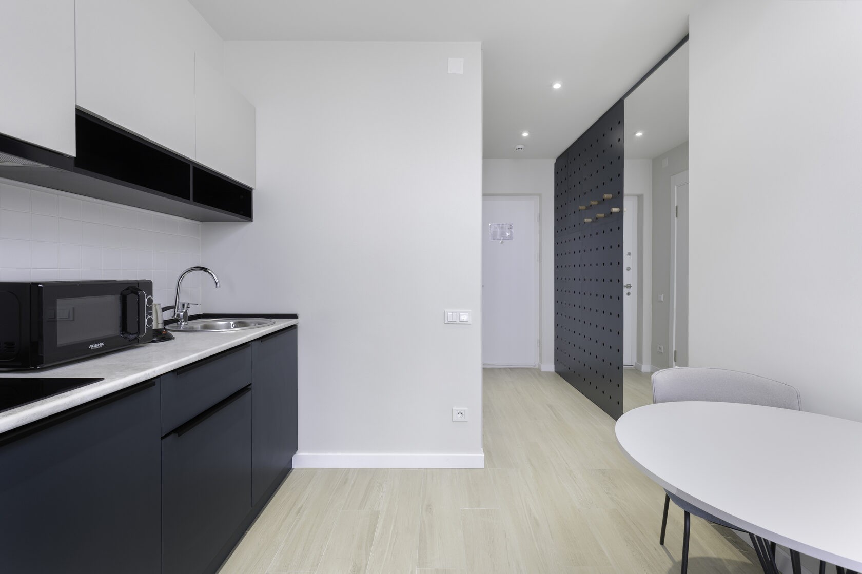 Kitchen and dining area at NEXT Apartments